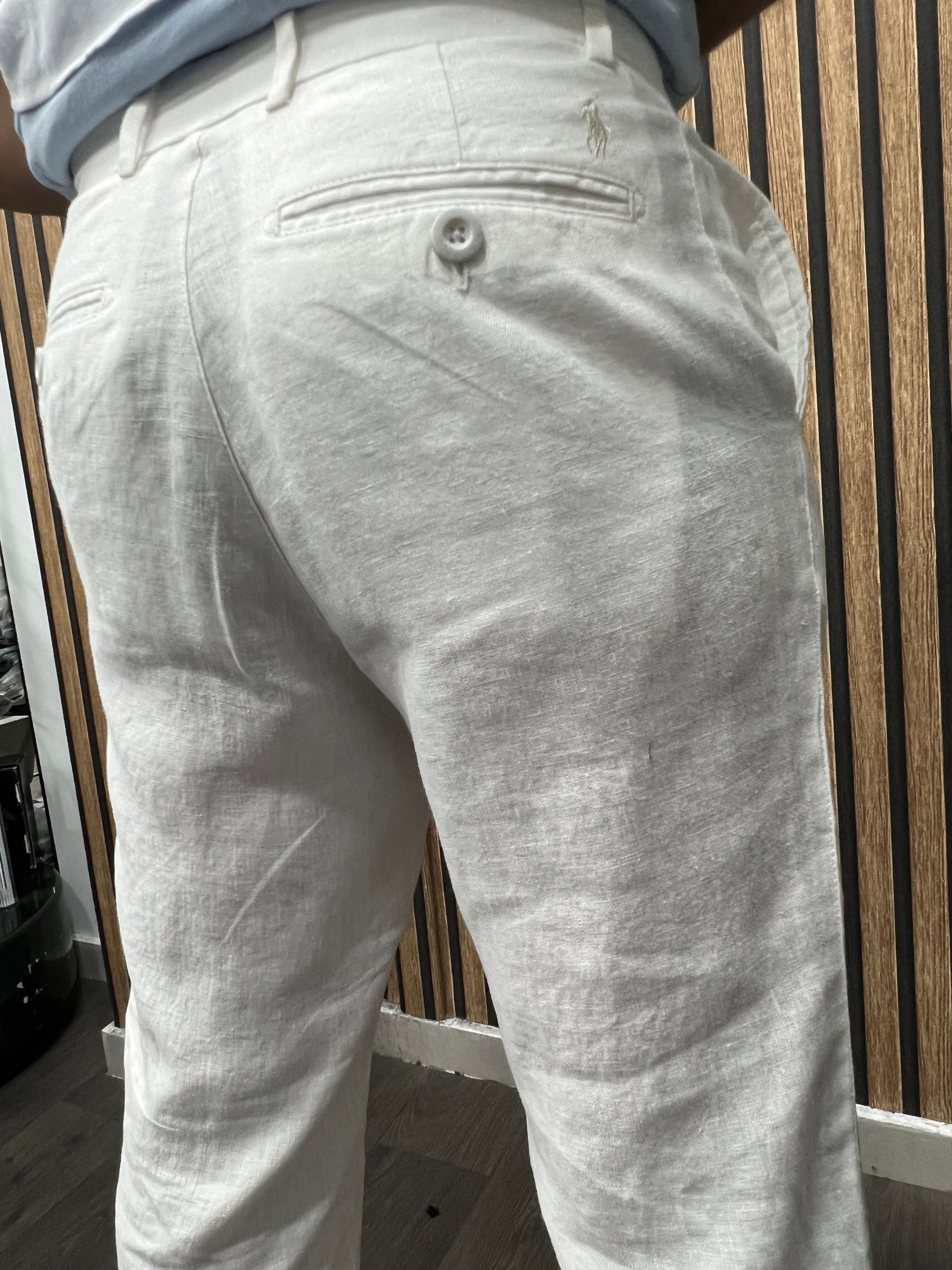 Polo Ralph Lauren (Zalando): Slim Tapered Fit λινό παντελόνι σε χρώμα "ceramic white".