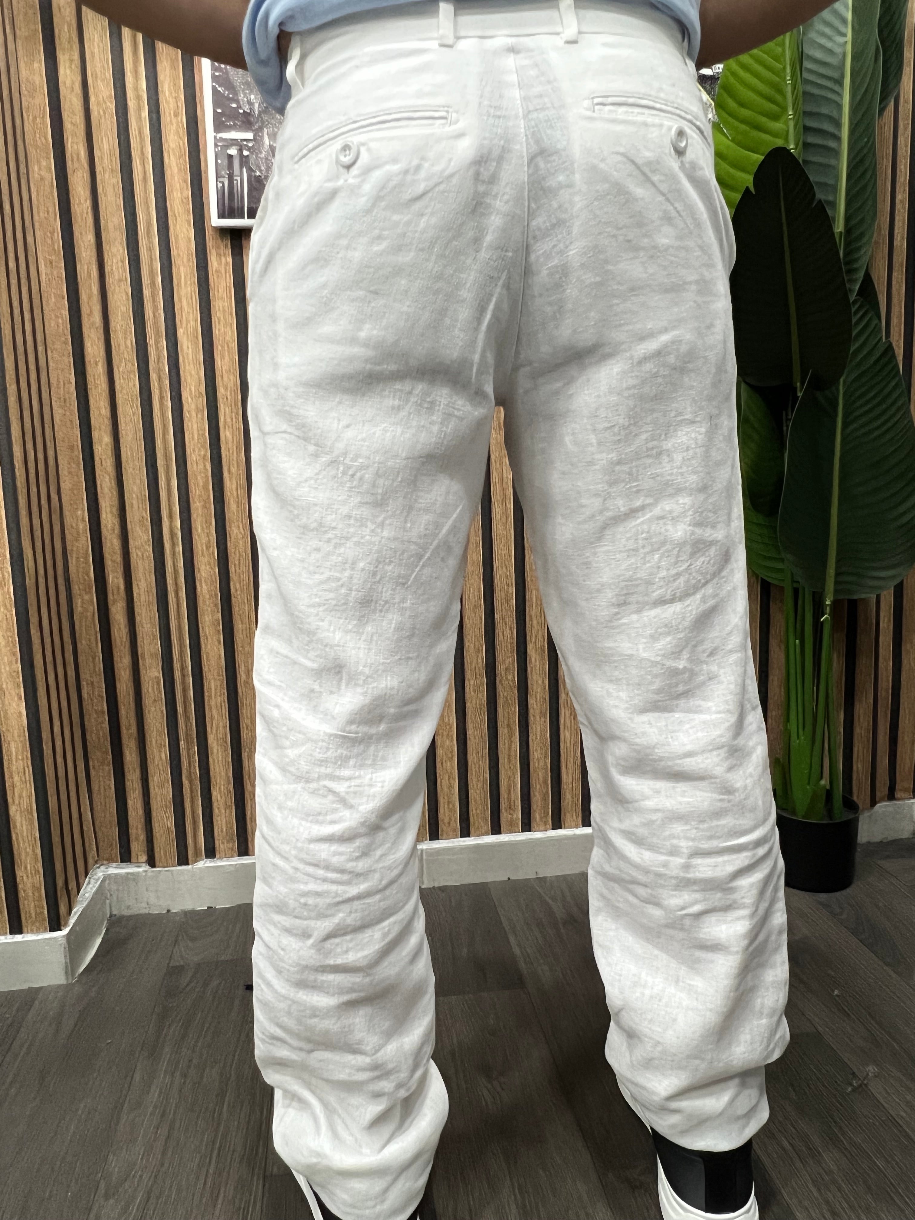 Polo Ralph Lauren (Zalando): Slim Tapered Fit λινό παντελόνι σε χρώμα "ceramic white".